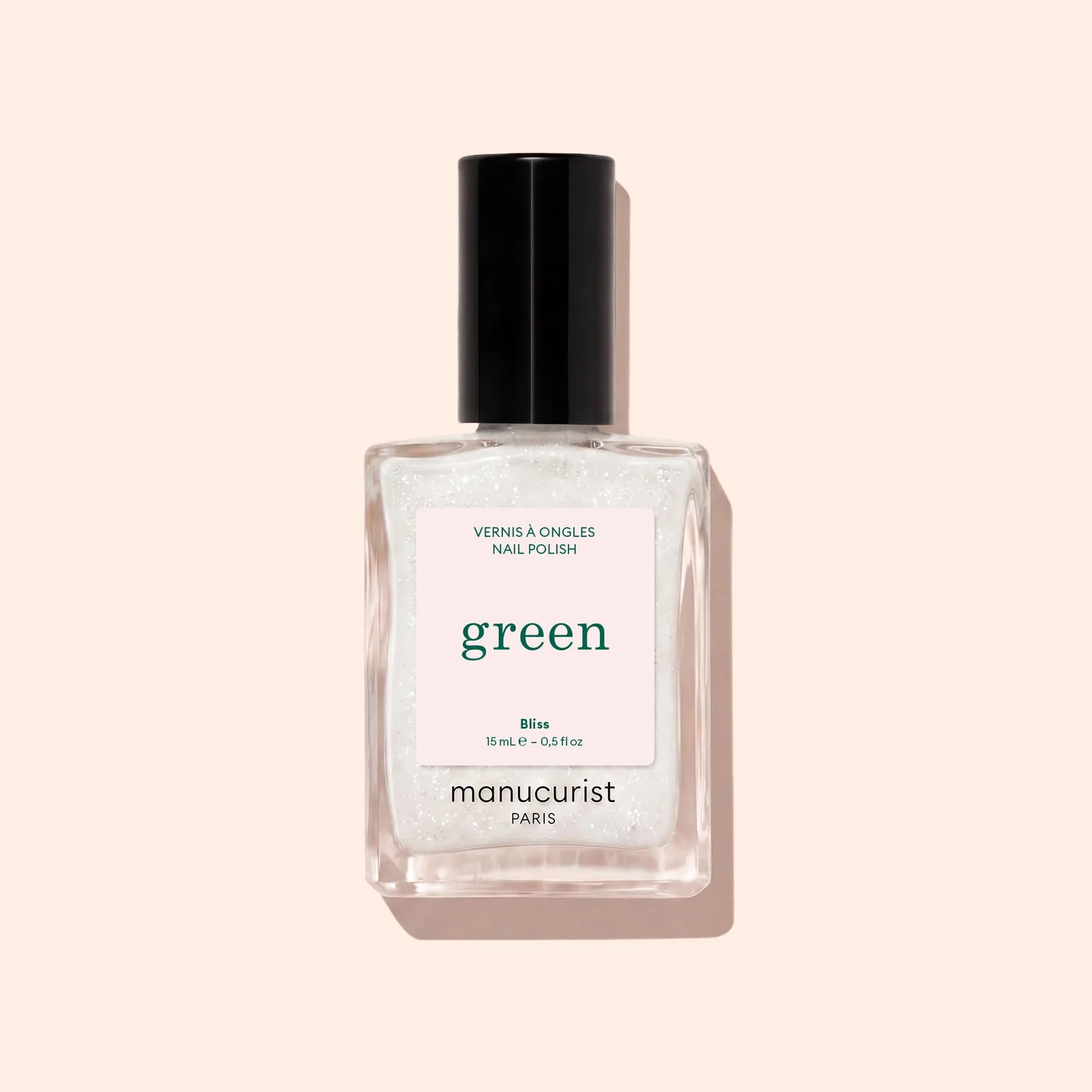 Lahvička Manucurist Green Bliss na světlém pozadí
