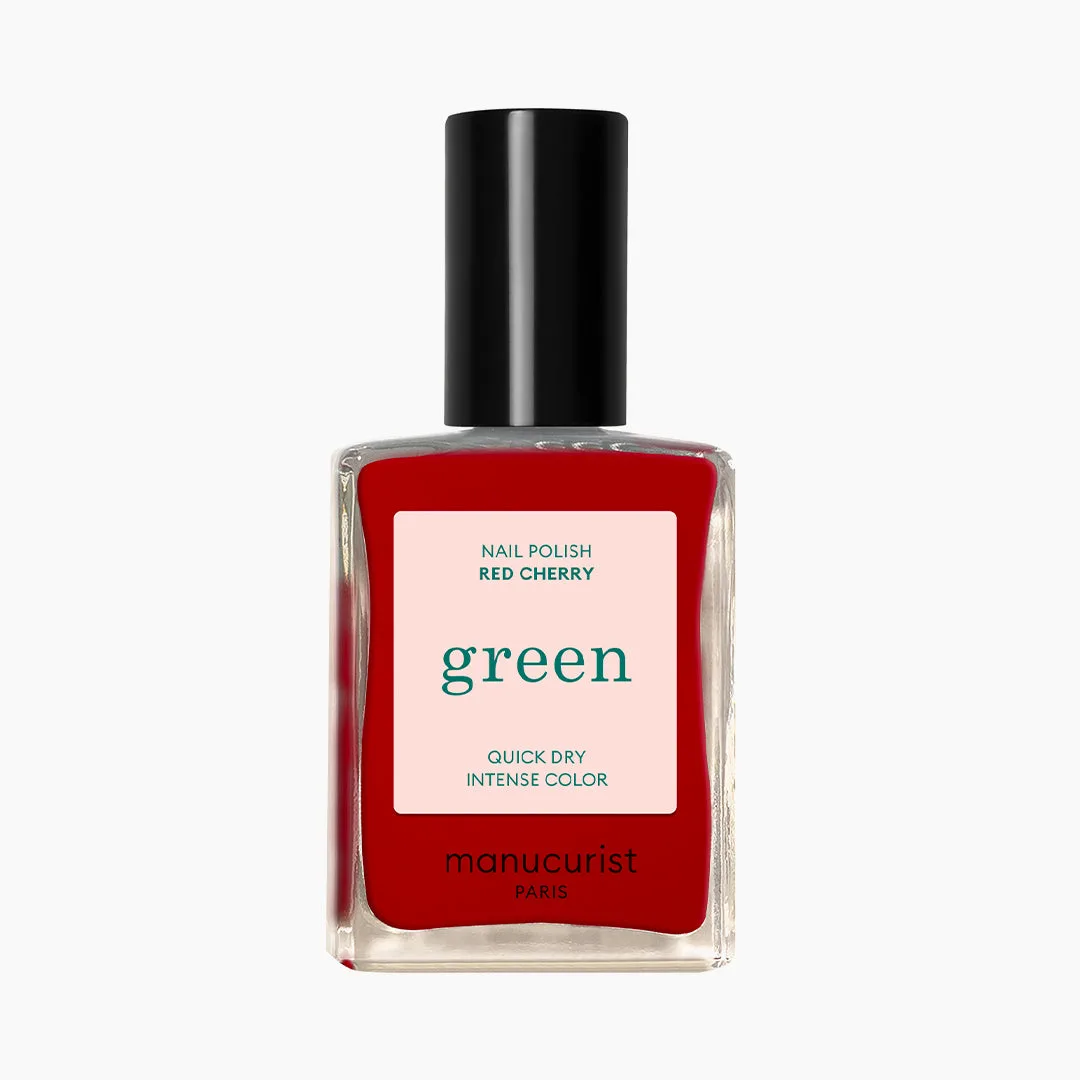Lahvička Green Red Cherry na světlém pozadí